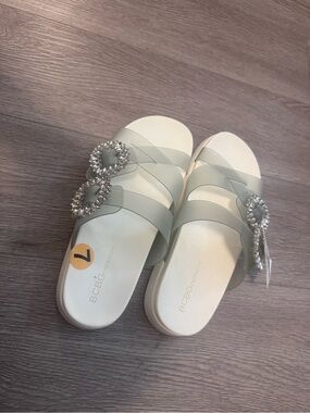 BCBGeneration Women's White Crystal Buckle Slide Sandals